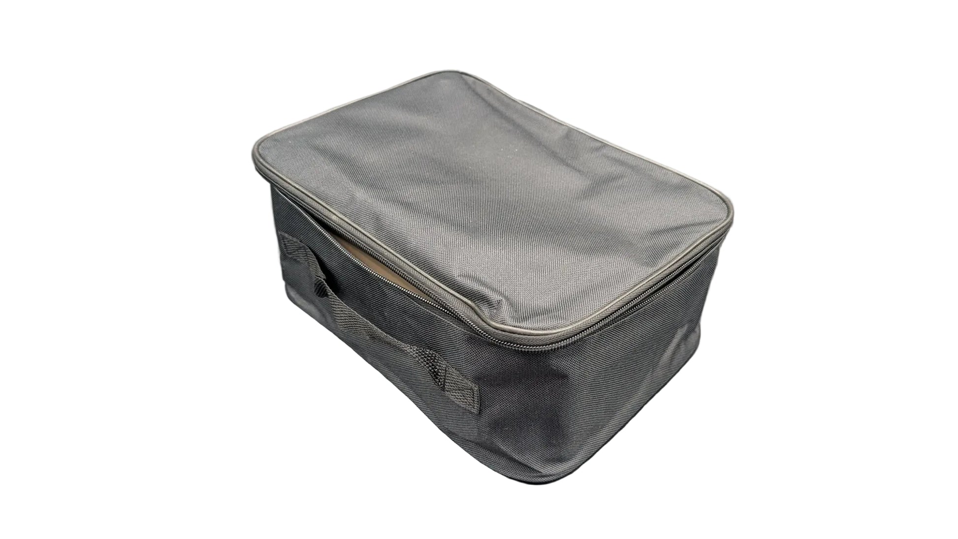 A gray zippered fabric storage bag or organizer case with a top handle, shown on a gray surface with reflective silver light panels in the background.